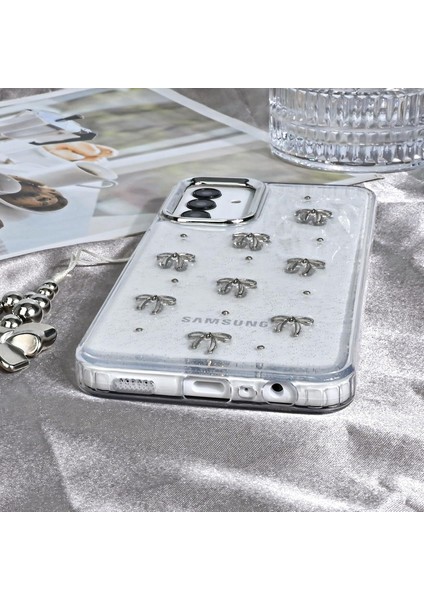 Tecno Spark 30C Kılıf Kamera Koruyucu Simli Fiyonk Desenli Kabartmalı Şeffaf Slikon Kapak modelleri