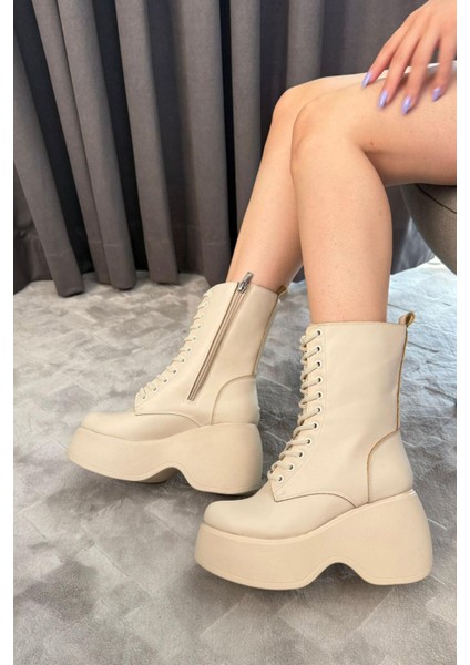 Kadın Riva Bej Cilt Yandan Fermuarlı Bağcıklı Yüksek Dolgu Topuklu Uzun Bot Bootie indirimleri