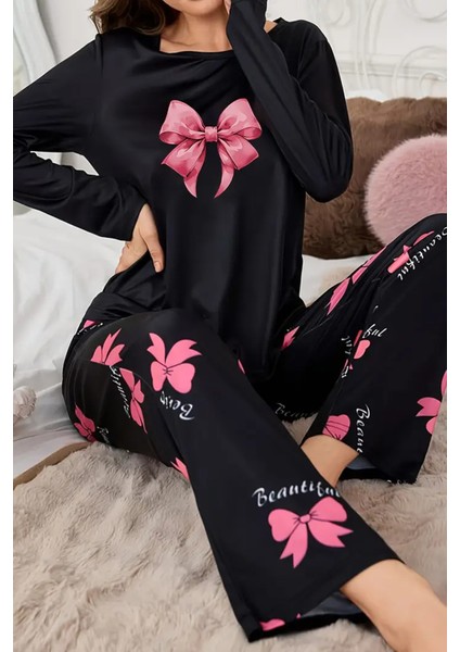 Şık ve Rahat Siyah Kadın Pijama Takımı - Kelebek Desenli ve Yay Detaylı Tasarım modelleri