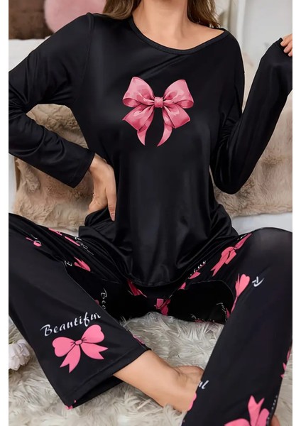 Şık ve Rahat Siyah Kadın Pijama Takımı - Kelebek Desenli ve Yay Detaylı Tasarım fırsatları