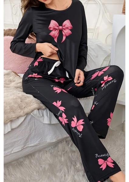 Şık ve Rahat Siyah Kadın Pijama Takımı - Kelebek Desenli ve Yay Detaylı Tasarım