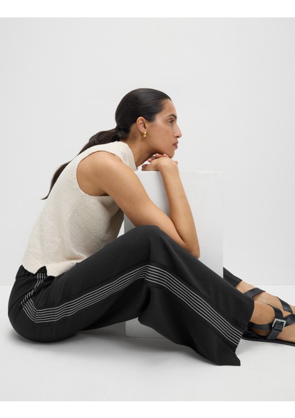 Dokuma Yan Şeritli Bol Paça Pantolon modelleri