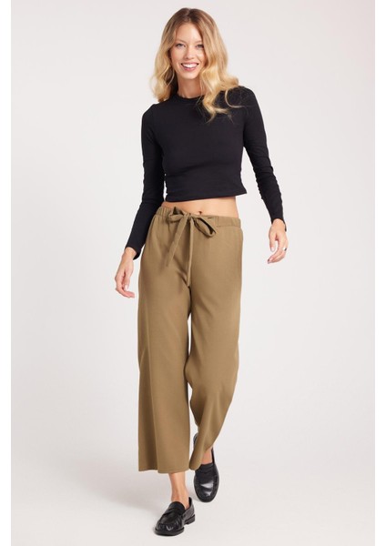 Kadın Relax Fit Rahat Kesim Lastikli Kuşak Bağlamalı Geniş Paça Haki Pantolon indirimleri