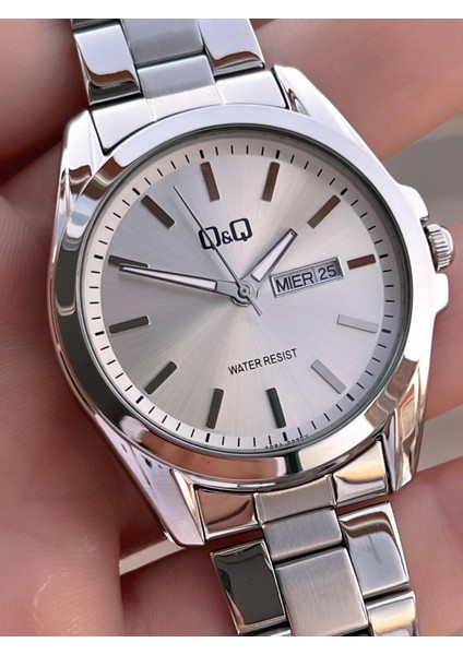 Çelik Kordon Takvimli Kadran 2 Yıl Garantili 3 Atm Suya Dayanıklı Erkek Kol Saati QQ.E2001.A1 modelleri