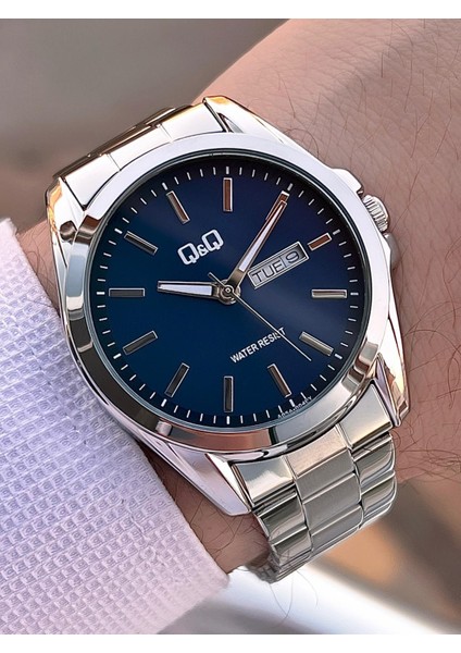 Çelik Kordon Takvimli Kadran 2 Yıl Garantili 3 Atm Suya Dayanıklı Erkek Kol Saati QQ.E2001.A2