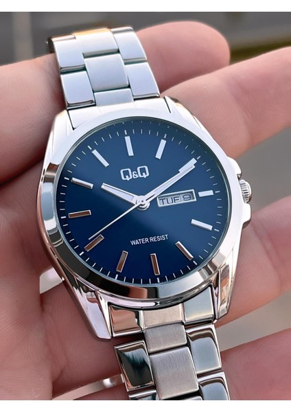 Çelik Kordon Takvimli Kadran 2 Yıl Garantili 3 Atm Suya Dayanıklı Erkek Kol Saati QQ.E2001.A2 modelleri