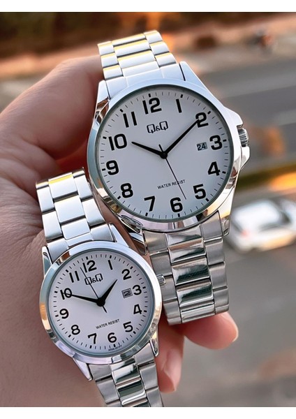 Çelik Kordon 2 Yıl Garantili 3 Atm Suya Dayanıklı Sevgili ve Ciftlere Özel Kol Saati QQ.CF001.1