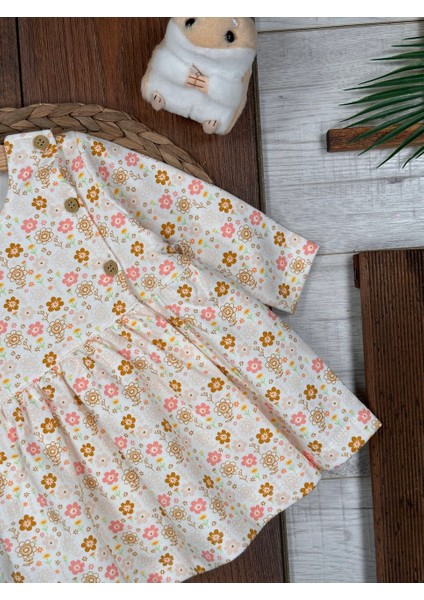 Pamuklu Çiçek Desenli Uzun Kollu Kız Bebek Elbisesi fiyatları