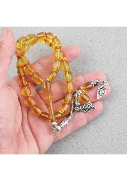 Ateş Kehribar Ayyıldız Işlemeli Imame Kapsül Kesim 9X11MM Tesbih - Sarı fiyatları
