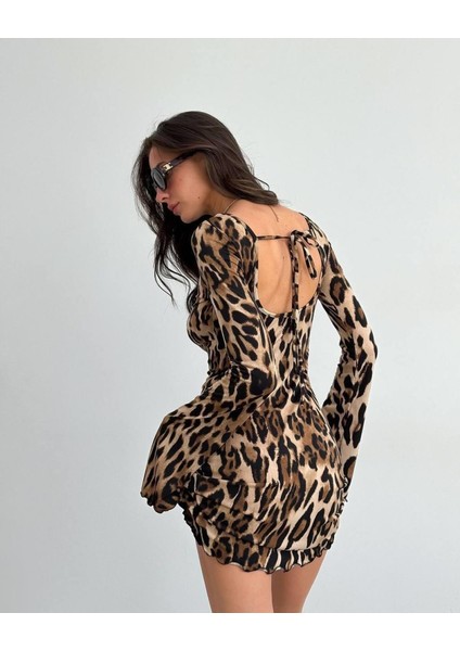 Kadın Uzun Kollu Sırtı Açık Bağlamalı Leopar Desenli Kısa Dalgıç Elbise indirimleri