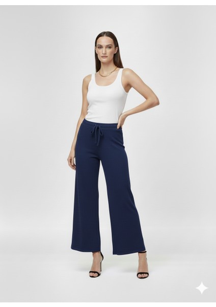 Pantolon Kuş Gözü Bağlama Detaylı