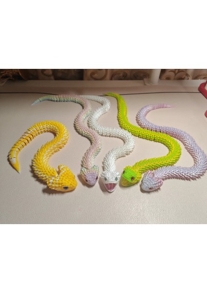 3D Baskı Esnek Hareketli Yılan Figürü – Realistik Oyuncak ve Dekor Modeli fiyatları