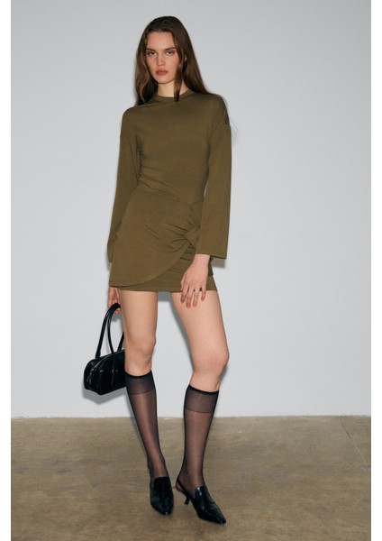 SEVLEY Kadın Yumuşak Ve Esnek Kumaşlı Yuvarlak Yakalı Bağlama Detaylı Mini Haki Elbise fiyatları