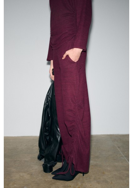 KANDIAS Kadın Yumuşak Ve Esnek Dokulu Yanlardan Fonksiyonel Büzgülü Bordo Eşofman Altı fiyatları