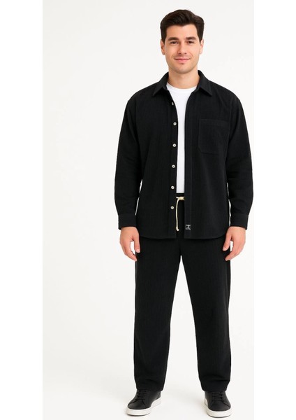 Erkek Kadife Oversize Takım – Gömlek ve Pantolon Ikili Set Füme Corduroy Şıklığı, Rahat ve Zarif Duruş Yumuşak Dokulu Kadife Kumaş, Düğmeli Gömlek Üst ve Lastikli Pantolon Alt Parça ile Gün Boyu Konfor- Siyah