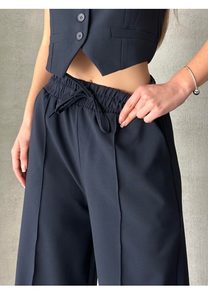 Beli Lastikli Polyviskon Pantolon Lacivert fiyatları
