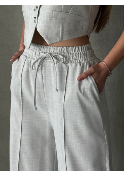 Beli Lastikli Polyviskon Pantolon Gri fiyatları