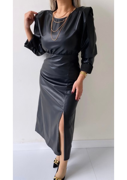Vatkalı Uzun Kol Yırtmaçlı Deri Elbise Siyah indirimleri