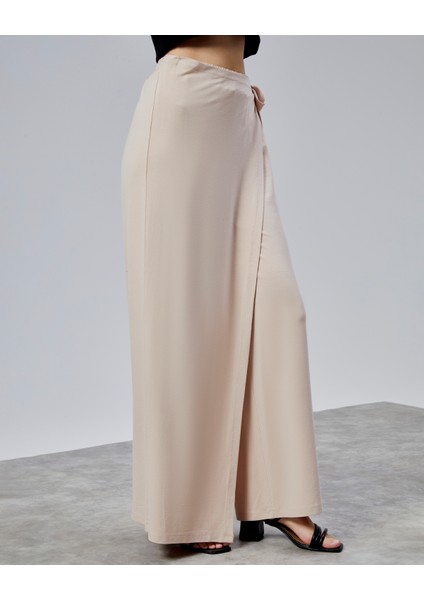 Kadın Lastikli Yüksek Belden Bağlamalı Geniş Paça Pantolon fırsatları