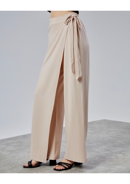 Kadın Lastikli Yüksek Belden Bağlamalı Geniş Paça Pantolon indirimleri