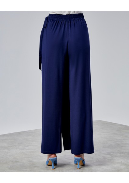 Kadın Lastikli Yüksek Belden Bağlamalı Geniş Paça Pantolon modelleri