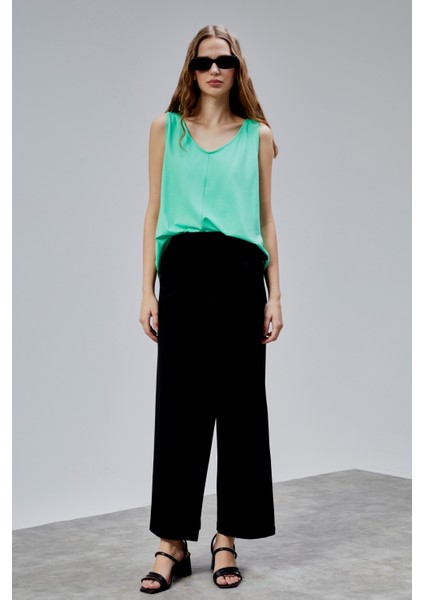 Kadın Lastikli Yüksek Belden Bağlamalı Geniş Paça Pantolon modelleri