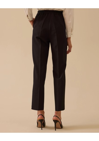 Beli Lastikli Bilek Boy Pantolon fiyatları