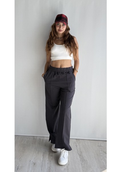Kadın Lastikli Yüksek Bel Yırtmaçlı Bol Paça Pantolon fiyatları