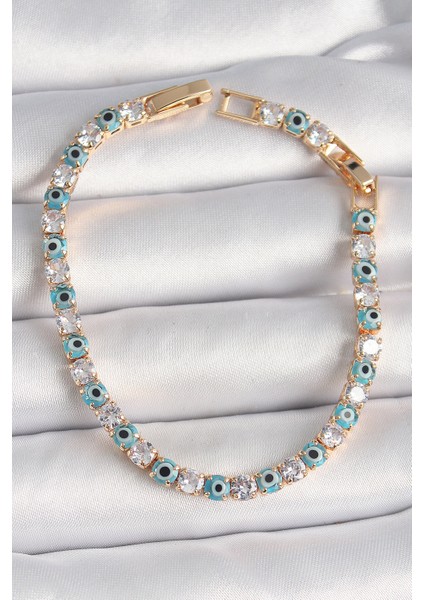 Pirinç Gold Renk Su Yolu Zirkon Taşlı Nazar Boncuklu Kadın Bileklik - Lisinya