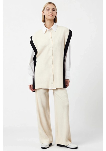 Kadın Alt Üst Renk Bloklu Düğmeli Triko Yelek ve Geniş Paça Pantolon Takımı Şık ve Rahat Kombin Spor fırsatları