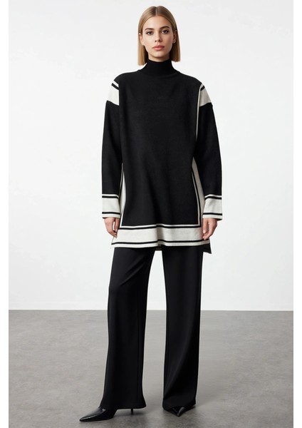 Kadın Alt Üst Çizgili Desenli Dik Yaka Triko Tunik ve Geniş Paça Pantolon Takımı ve Konforlu Günler fırsatları