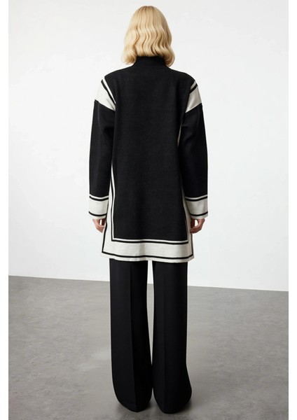 Kadın Alt Üst Çizgili Desenli Dik Yaka Triko Tunik ve Geniş Paça Pantolon Takımı ve Konforlu Günler indirimleri