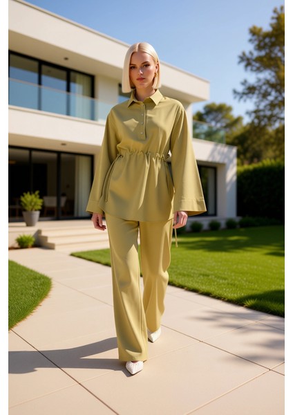 Kadın Alt Üst Bağcık Detaylı Belden Büzgülü Uzun Kollu Dokuma Gömlek ve Geniş Paça Pantolon Takımı fiyatları