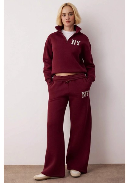 Genç Kız Nakış Detaylı Dik Yaka Yarım Fermuarlı Wideleg Geniş Paça Örme Eşofman Takımı Şık fırsatları