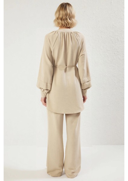 Modern Kesim Sedef Düğmeli Bağlama Detaylı Tunik ve Rahat Kalıp Geniş Paça Pantolon Takımı Kadın indirimleri
