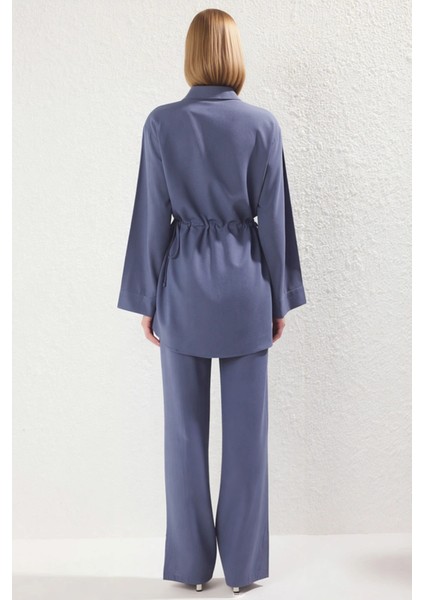 Kadın Alt Üst Bağcık Detaylı Belden Büzgülü Uzun Kollu Dokuma Gömlek ve Geniş Paça Pantolon Takımı indirimleri