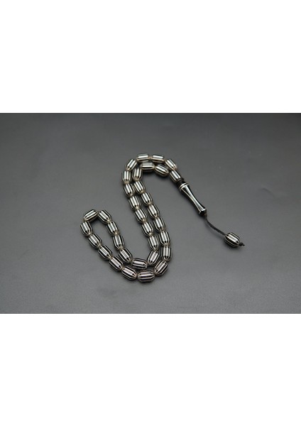 Siyah İnci Oltutaşı 12'li Uçlu Kapsül Oltu Taşı Tesbih ST000153 indirimleri