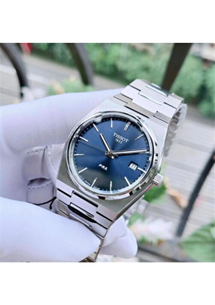 T137.410.11.041.00 Erkek Metal Kordonlu Analog Kol Saati 10 ATM Suya Dayanıklı