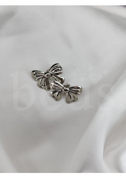 - Kurdele Şeklinde Çelik Küpe modelleri