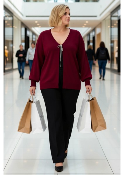Kadın V Yaka Bağlama Detaylı Balon Kol Triko Hırka Günlük Şıklık ve Konfor Sunan Tasarım Şık modelleri