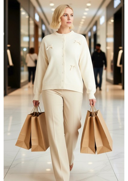 Kadın Fiyonk Işlemeli Bisiklet Yaka Uzun Kollu Regular Kesim Triko Hırka Rahat ve Şık Görünüm modelleri