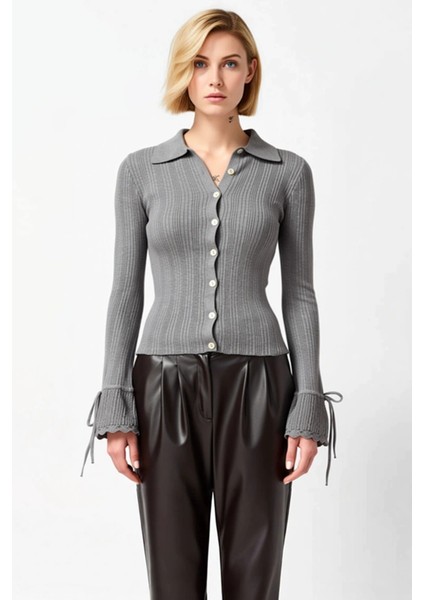 Kadın Zamansız Şıklık Fitilli Polo Yaka Uzun Kollu Manşet Bağlama Detaylı Düğmeli Triko Hırka fırsatları