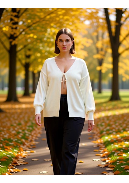 Kadın V Yaka Bağlama Detaylı Balon Kol Triko Hırka Günlük Şıklık ve Konfor Sunan Tasarım Şık