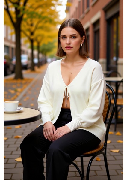 Kadın V Yaka Bağlama Detaylı Balon Kol Triko Hırka Günlük Şıklık ve Konfor Sunan Tasarım Şık fiyatları