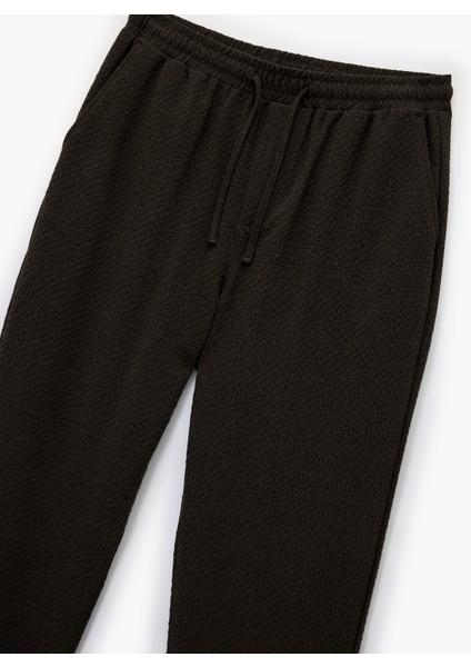 Duble Paça Cepli Viskon Karışımlı Beli Bağcıklı Pantolon modelleri