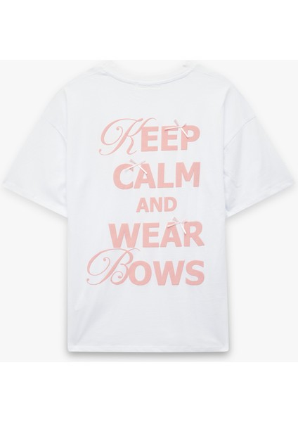 Kısa Kollu Bisiklet Yaka Pamuklu Fiyonklu Arkası Baskılı Oversize Tişört fiyatları