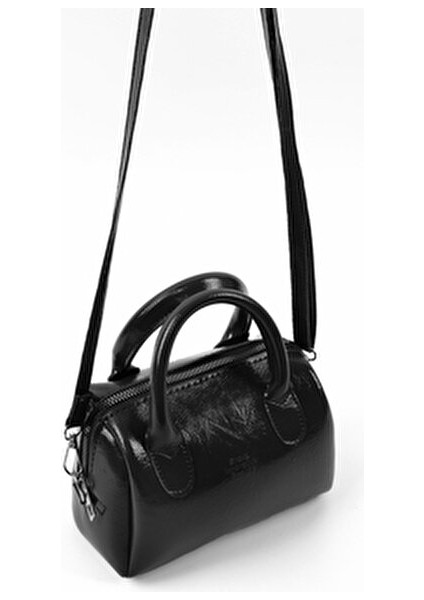 Kırışık Dokulu Siyah SHK184 Suni Deri ,fermuarlı Tek Bölmeli ,askılı El, Kol ve Omuz Çantası indirimleri