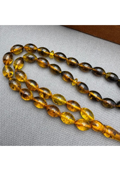 1000 Ayar Kazazlı Süzme Fosilli Dominik Damla Kehribar Tespih