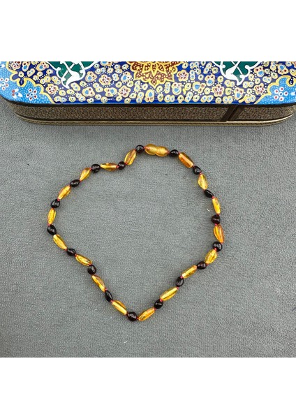 Şeffaf ve Fosilli Bebek Damla Kehribar Kolye