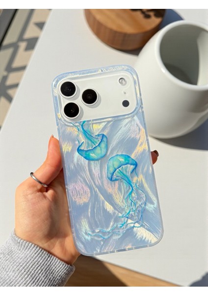 iPhone 17 Pro Uyumlu Deniz Anası Desenli Tüylü Hologramlı Silikon Kılıf fırsatları